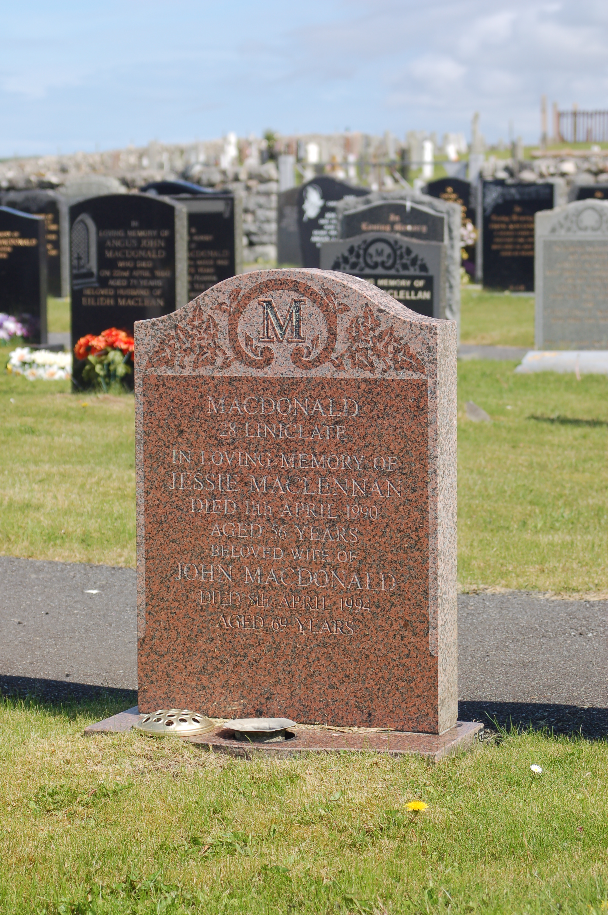 Photo of headstones/Jessie MacLennan d1990 hdstn Benbecula Nunton cem